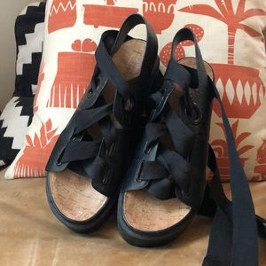 Urban Outfitters• ankle lace up snake print sandal